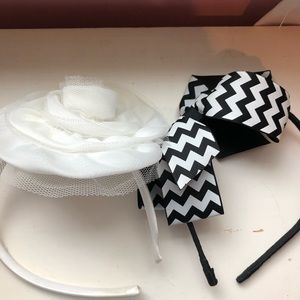 Two fancy head kid head bands